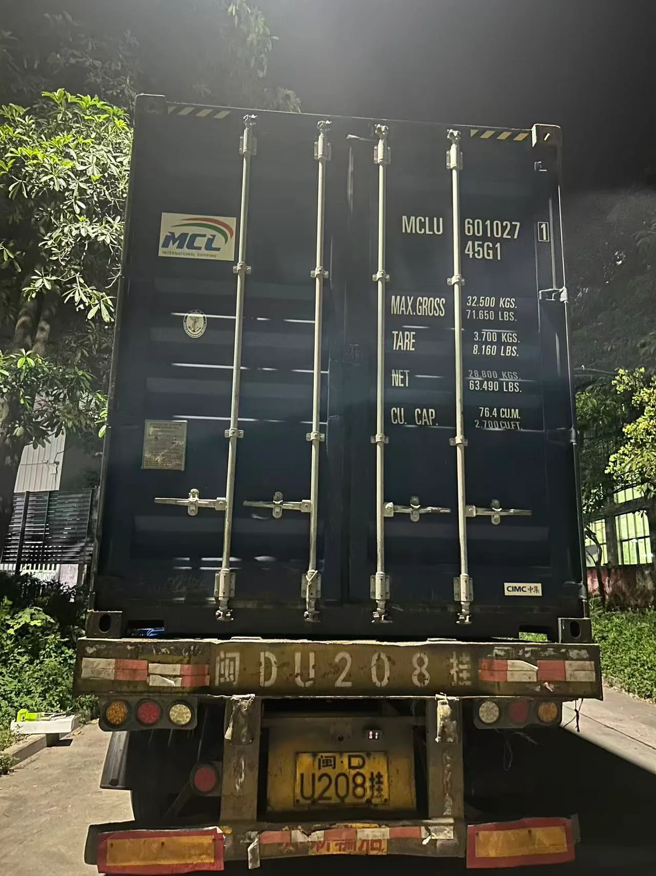 Shipping container outside the workshop