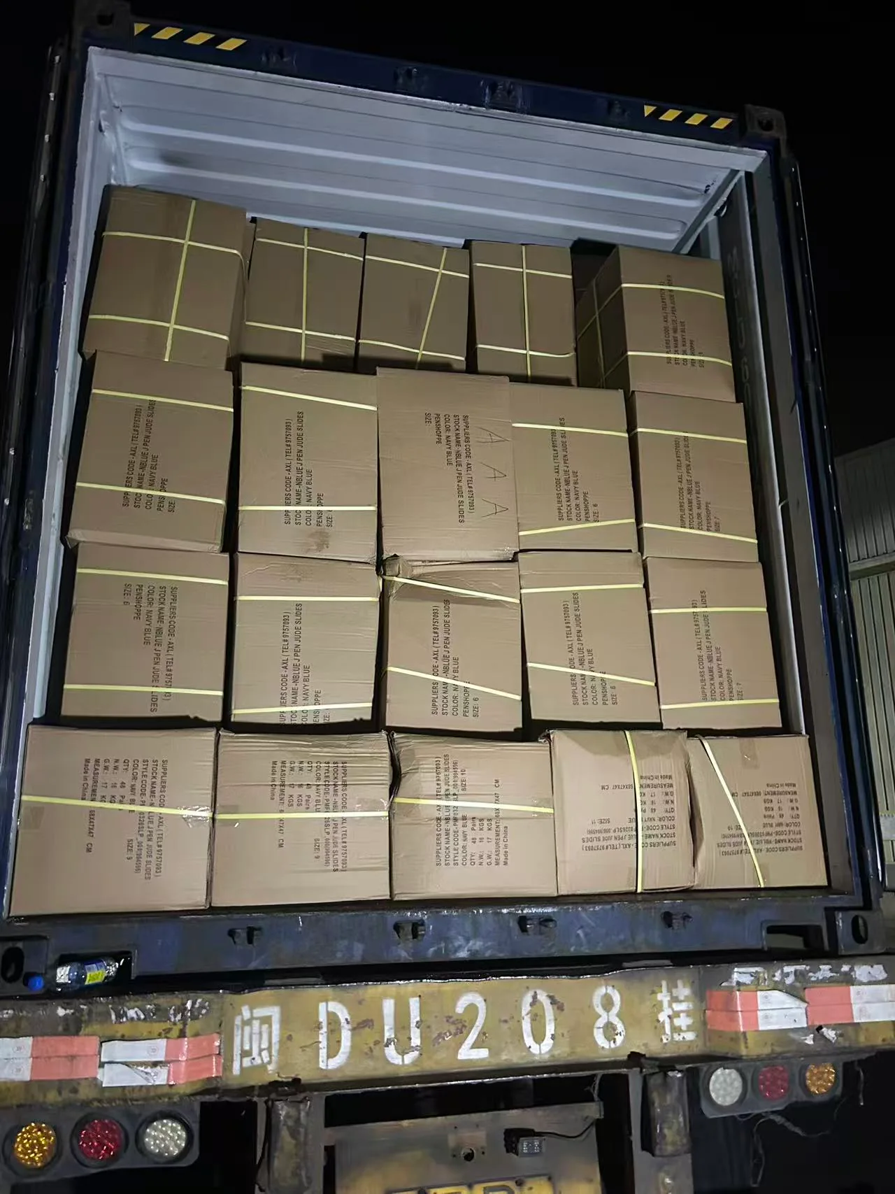 Cartons loaded inside a shipping container
